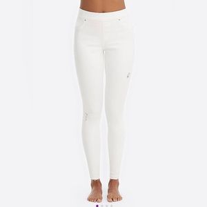 SPANX distressed skinny jeans.